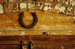 A horseshoe over the door for luck is an old tradition that is still in widespread practice today!  Image: Helen Cook via Flickr